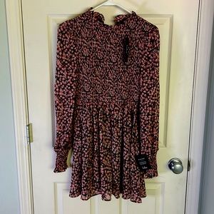 New with tags Lulu’s floral print smocked skater dress.